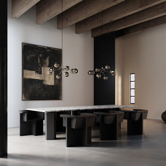 Drop Globe Chandelier Mini by 101 Copenhagen featuring sculptural globe shades and adjustable arms in a sleek, contemporary design.

