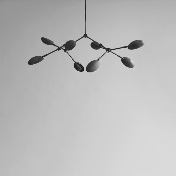 101 Copenhagen Drop Chandelier Mini in oxidized finish, showcasing 14 adjustable arms and sculptural shades, perfect for contemporary interiors.