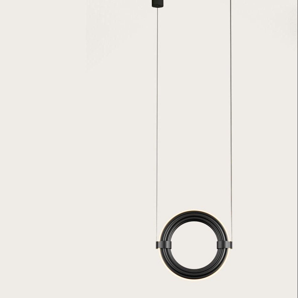 Ellis Pendant Lamp by Aromas del Campo with sleek modern design and warm ambient glow, ideal for stylish contemporary interiors.