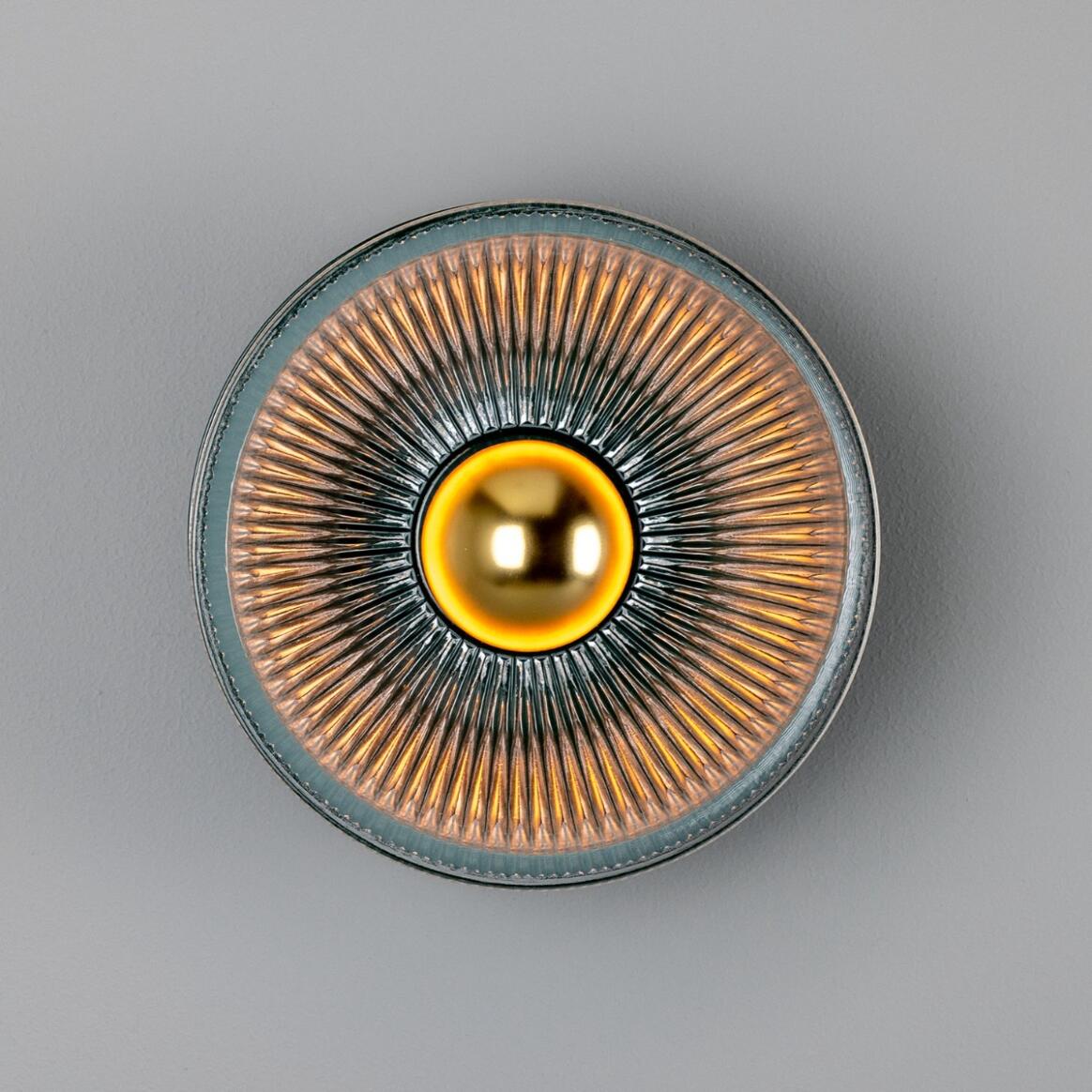 Eclipse Coloured Brass and Prismatic Glass Dish Wall Light by Mullan Lighting with a radiant brass finish and textured prismatic glass for elegant ambient lighting