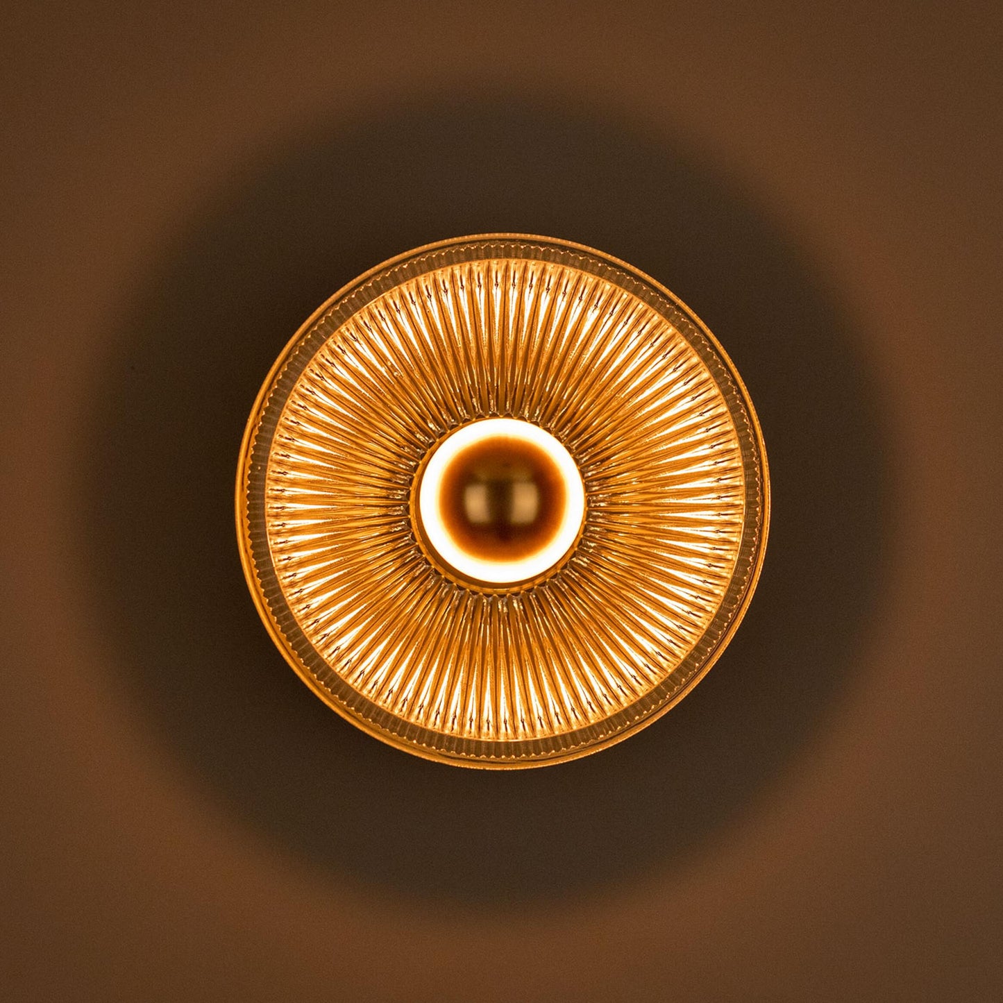 Eclipse Dish Wall Lamp by Mullan Lighting featuring a striking dish-shaped design that creates a dramatic, ambient wall lighting effect