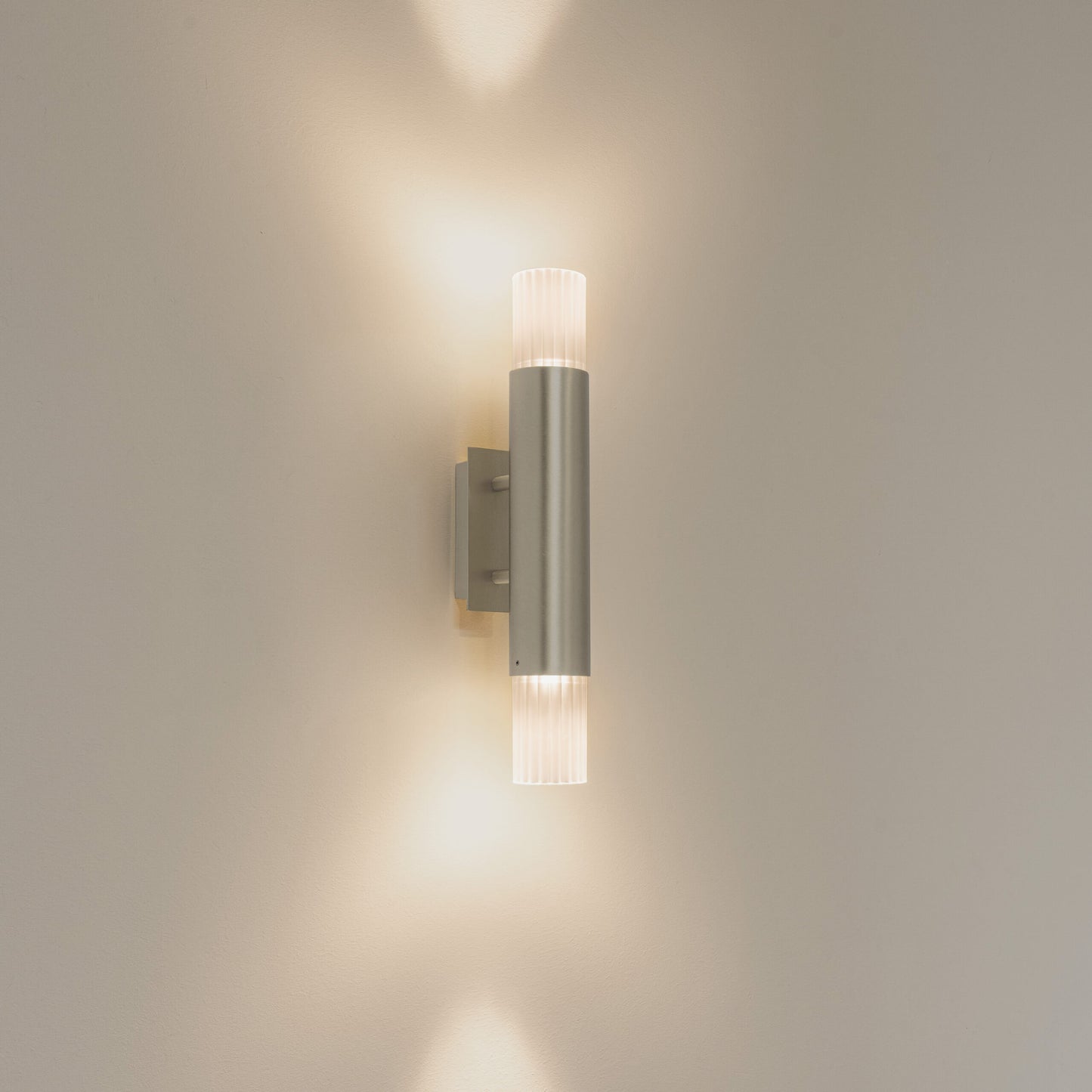 Embrace wall lamp by Ilfari, modern European designer wall lighting with sculptural luxury design for premium interiors