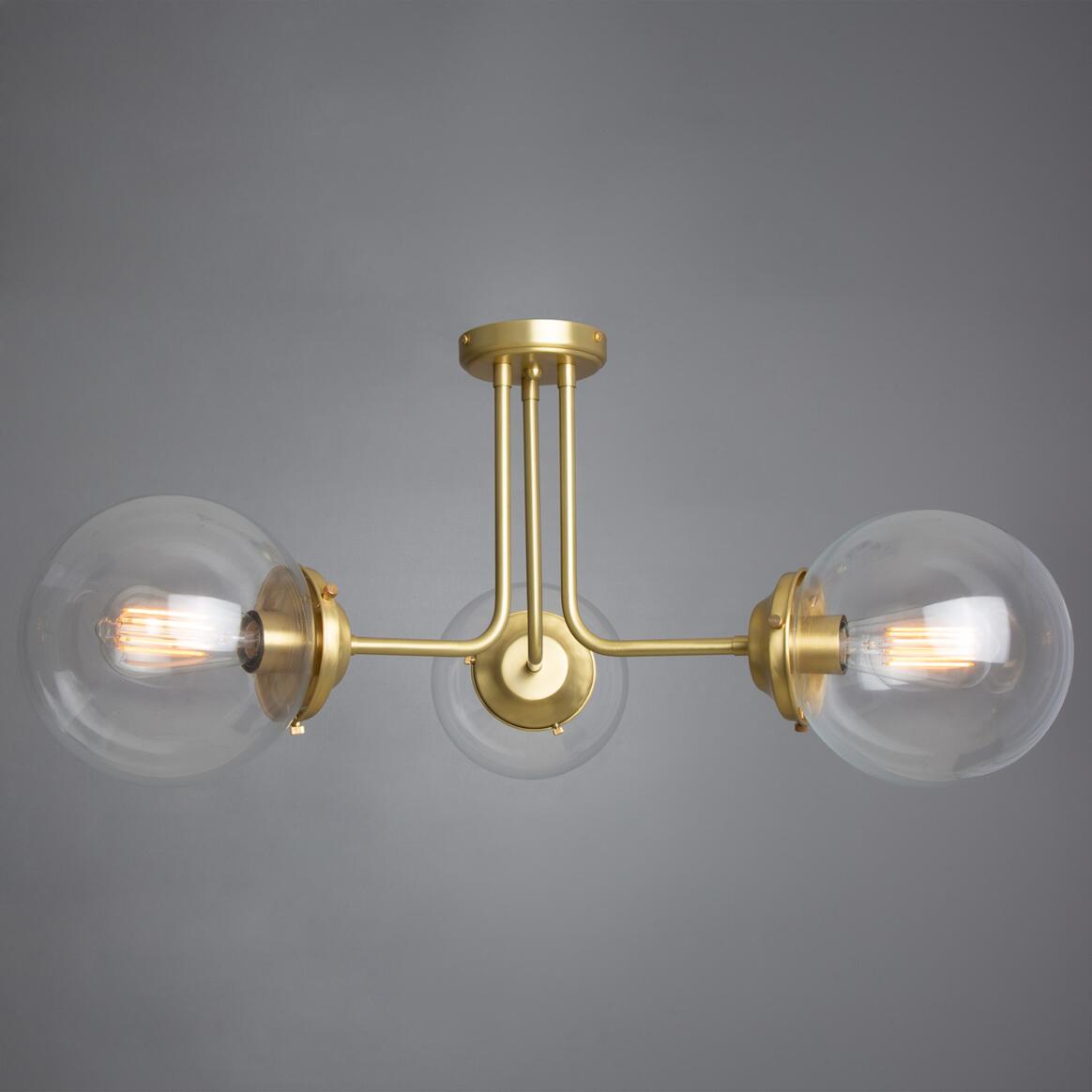 Hayes Ceiling Chandelier by Mullan Lighting featuring a modern geometric frame with multiple lights, offering bold chandelier lighting for luxury interiors.