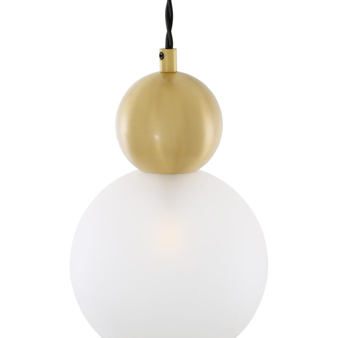 Pendant light with gold spherical fixture and white bulb on a white background