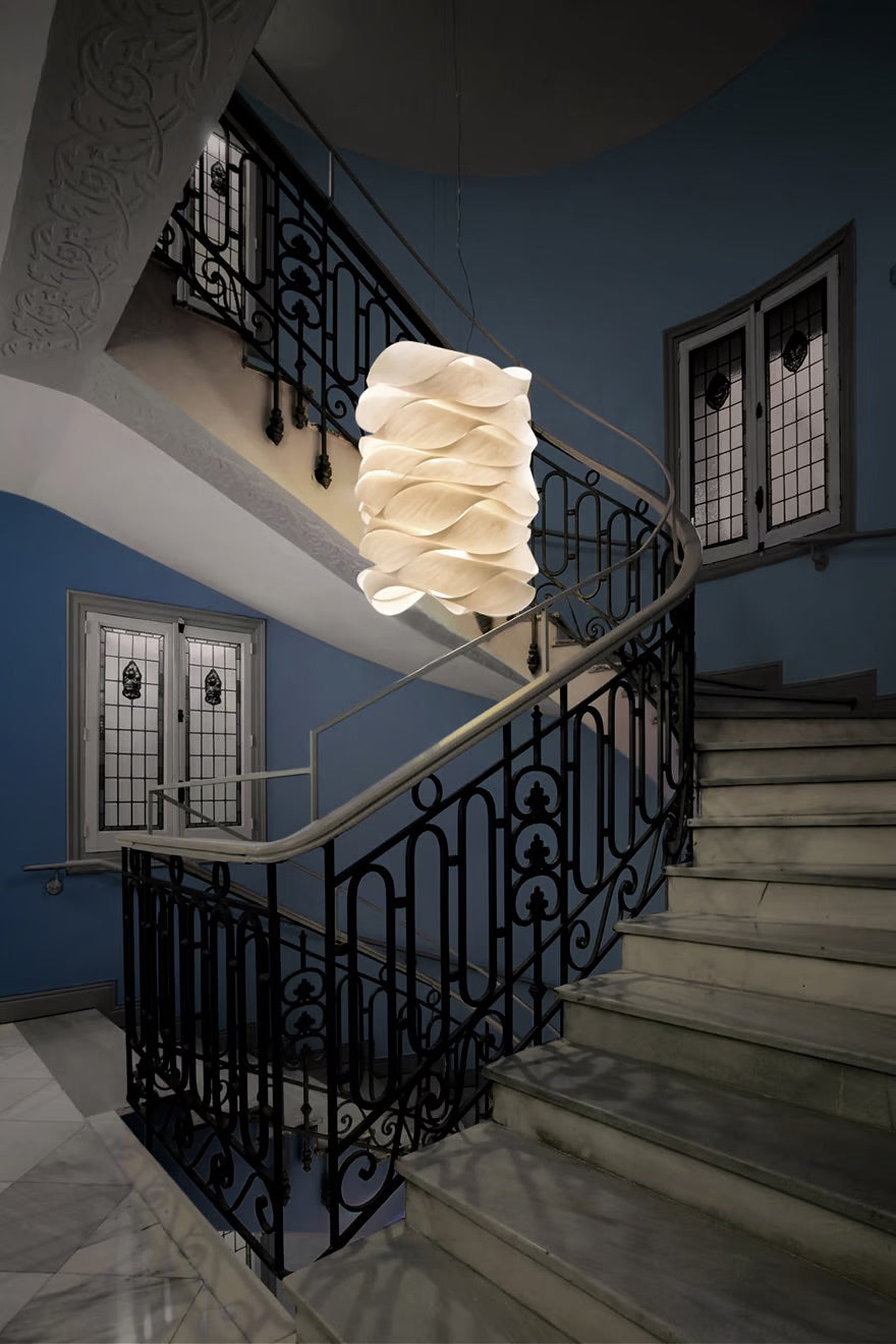 white suspension lamp. long light-weight suspension light for staircase.