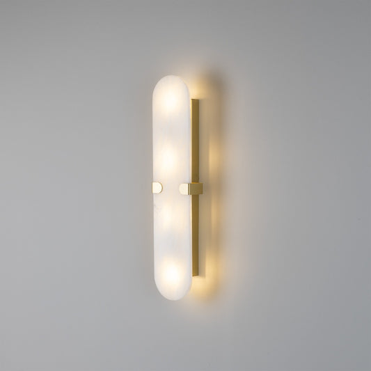 Lothian Oval Alabaster Wall Lamp by Mullan Lighting with a smooth oval alabaster shade offering soft, diffused light for elegant interior spaces.
