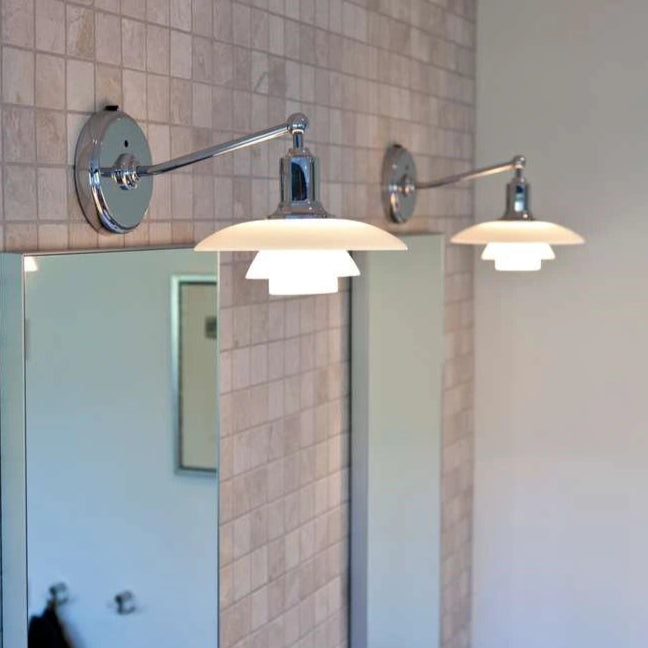 White & chrome wall light by Louis Poulsen  in India