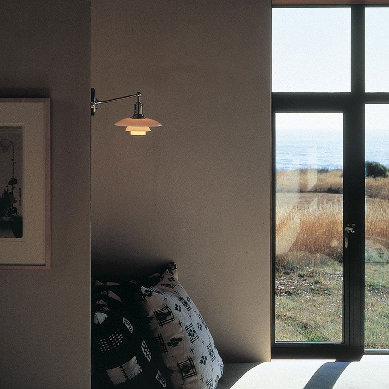 White & chrome wall light by Louis Poulsen  in India