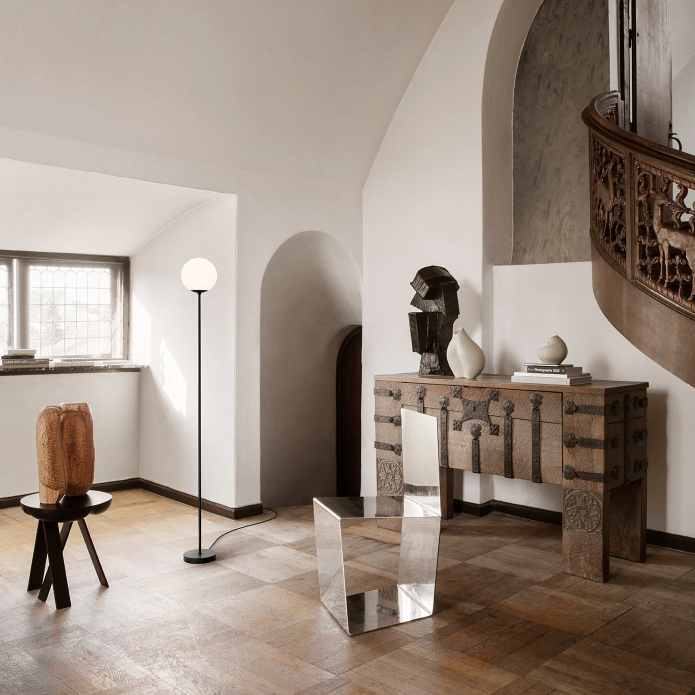 Astep Model 1081 Floor Lamp featuring a spherical opaline glass diffuser on a slim metal stand, delivering soft ambient light with mid-century elegance.