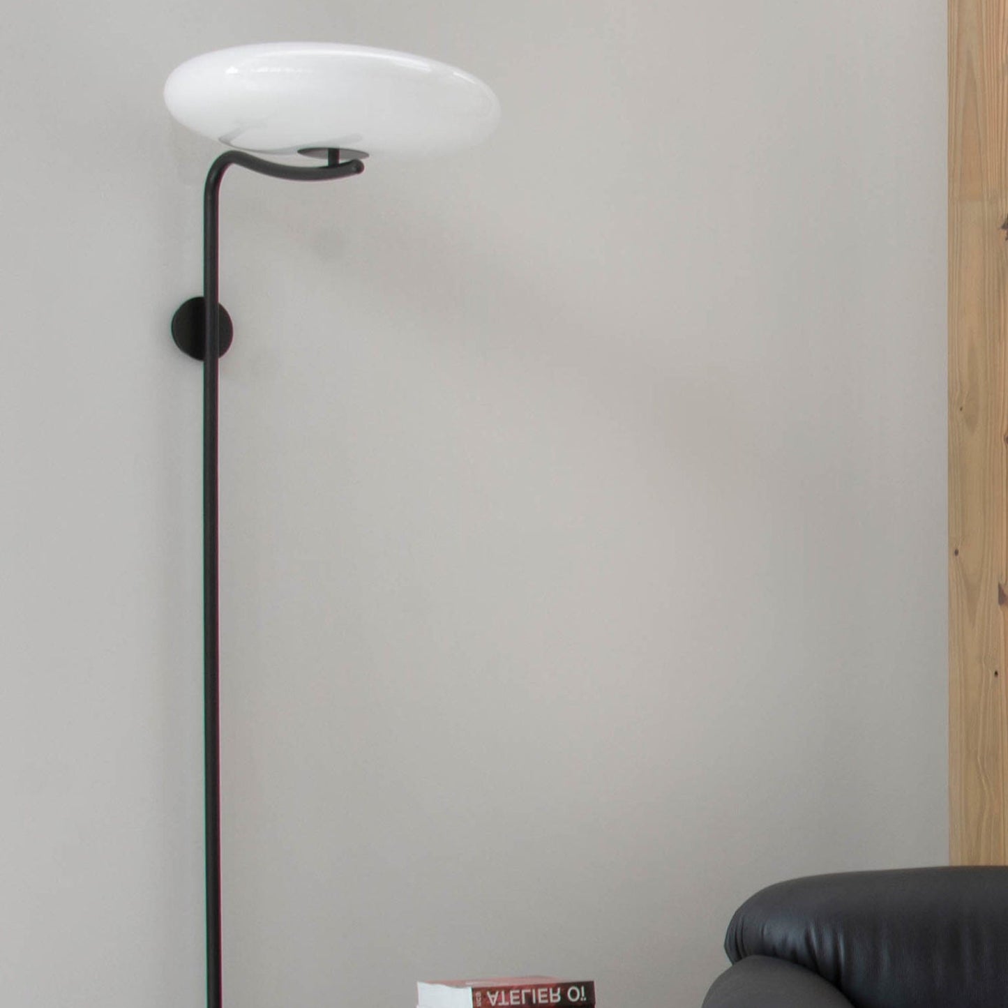 Model 2065 Wall Lamp by Astep – modern minimalist design with opaline shade, elegant aluminum structure, and soft ambient lighting.