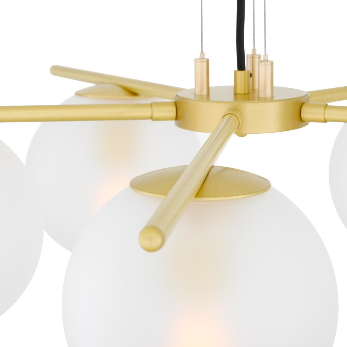 The Madison chandelier is a contemporary glass ball chandelier with five arms. Each brass arm radiates from a brass centre, stretching to a total diameter of 80cm.

A 17cm glass globe shade is elegantly suspended from each brass sleeve. The glass ball shade can be clear or frosted and is internally threaded to fit seamlessly into the gallery above.

The Madison glass ball chandelier is carefully suspended using three strands of discreet but strong catenary wire that are attached to the supplied cast brass c