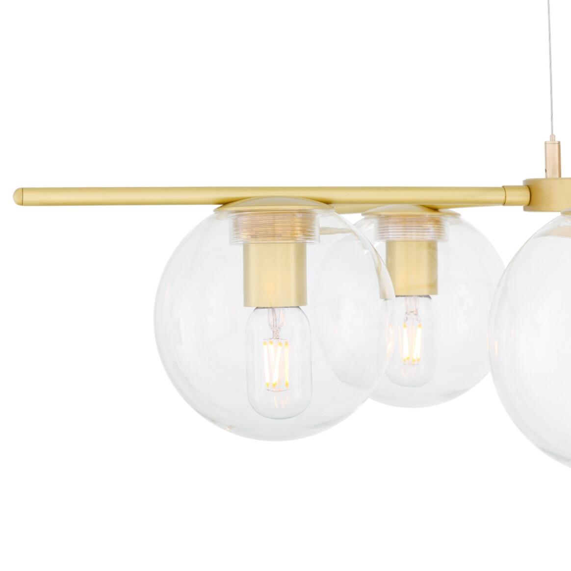 The Madison chandelier is a contemporary glass ball chandelier with five arms. Each brass arm radiates from a brass centre, stretching to a total diameter of 80cm.

A 17cm glass globe shade is elegantly suspended from each brass sleeve. The glass ball shade can be clear or frosted and is internally threaded to fit seamlessly into the gallery above.

The Madison glass ball chandelier is carefully suspended using three strands of discreet but strong catenary wire that are attached to the supplied cast brass c