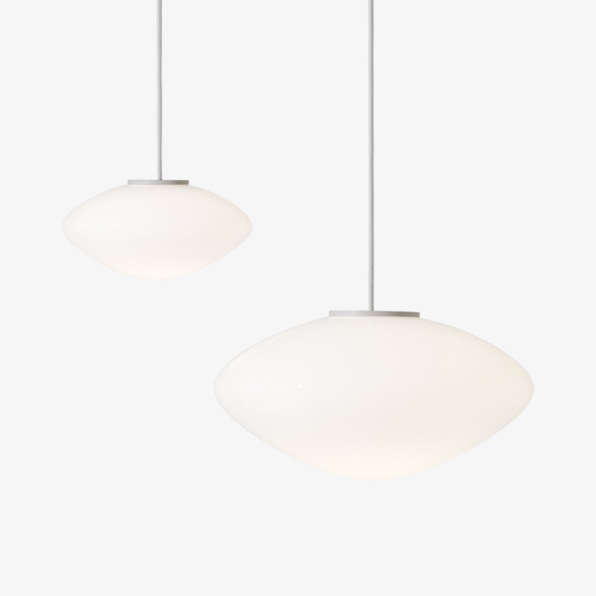 Mist AP15 Pendant by &Tradition – elegant frosted glass pendant light with sculptural design, perfect for soft ambient lighting in modern spaces.







