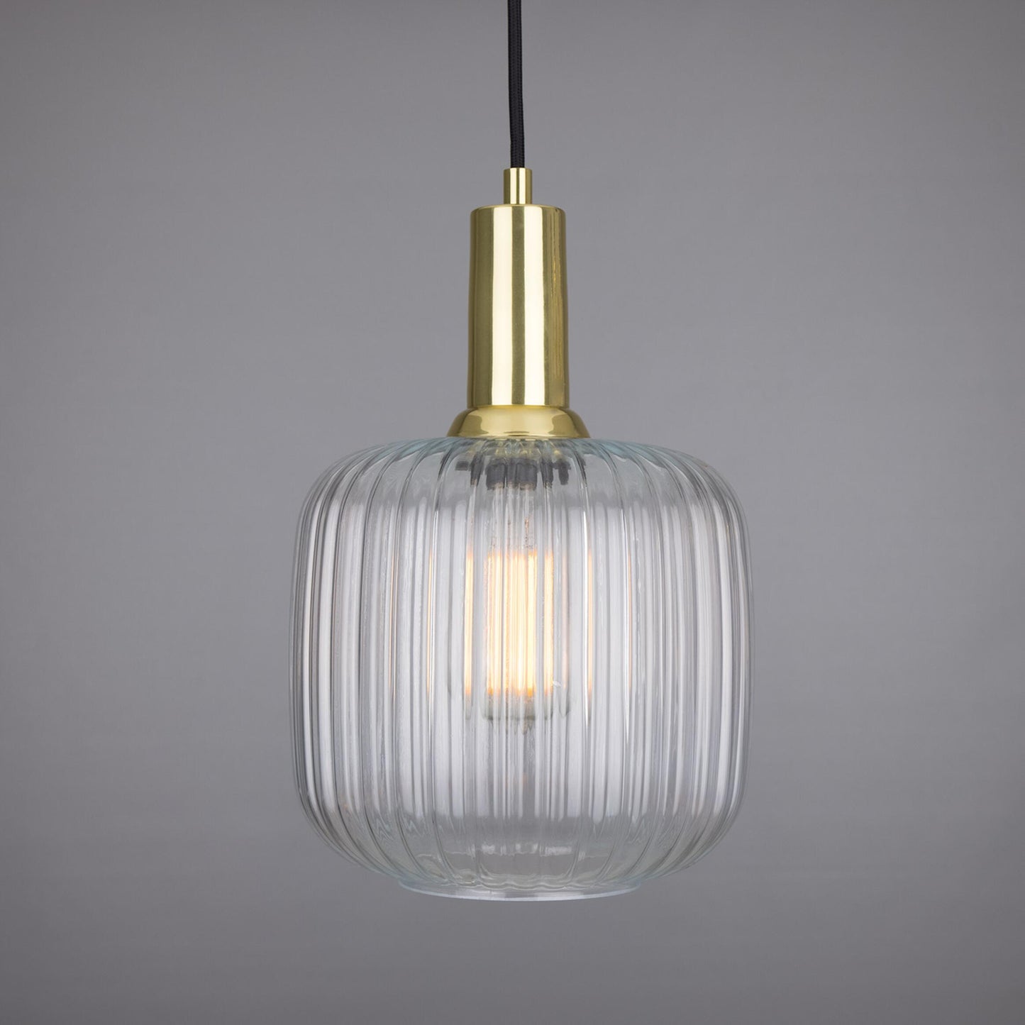Nahla Pendant Lamp by Mullan Lighting featuring an elegant glass shade and refined frame, ideal for modern pendant lighting in stylish interiors