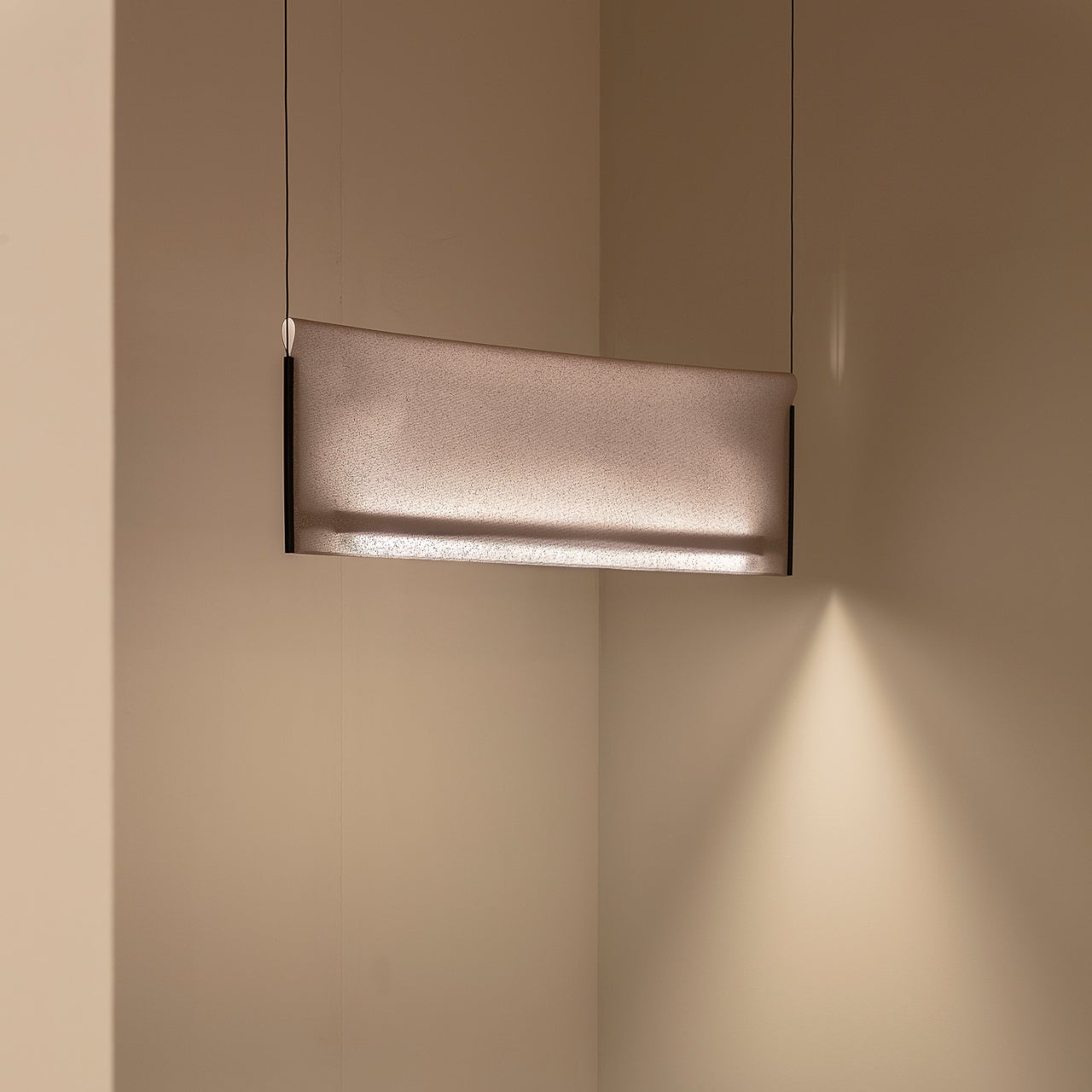 Nebra Pendant Lamp featuring a sleek modern design with soft ambient illumination, perfect for contemporary interior spaces.
