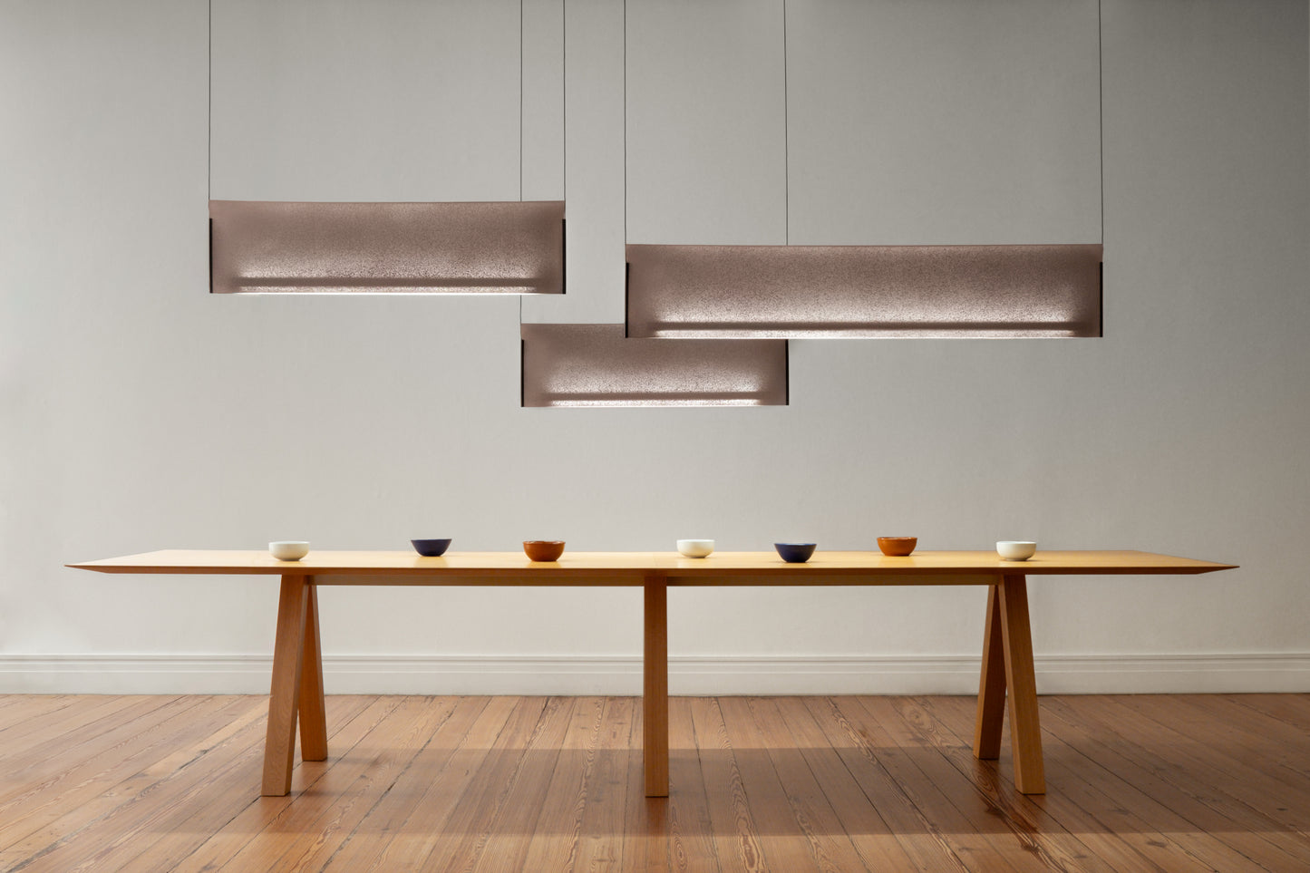 Nebra Pendant Lamp featuring a sleek modern design with soft ambient illumination, perfect for contemporary interior spaces.