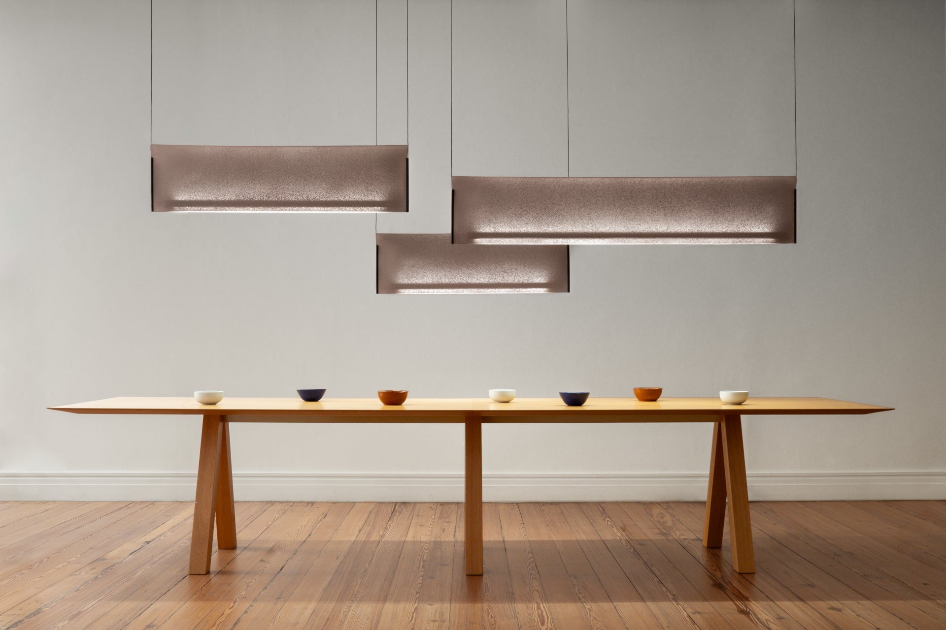 Nebra Pendant Lamp featuring a sleek modern design with soft ambient illumination, perfect for contemporary interior spaces.