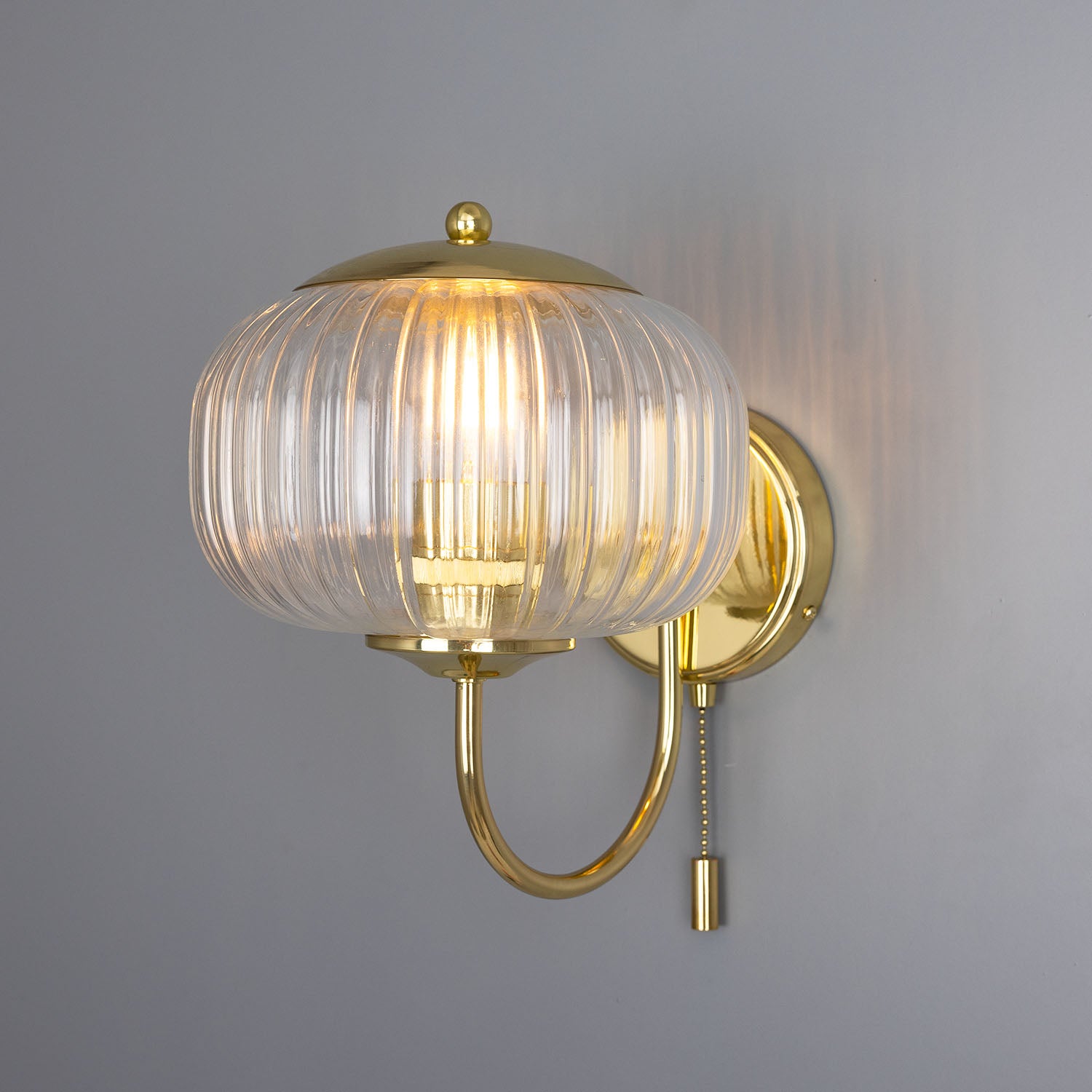 Nehir Wall Lamp by Mullan Lighting with a sleek, modern design and warm ambient illumination, ideal for contemporary and timeless interiors