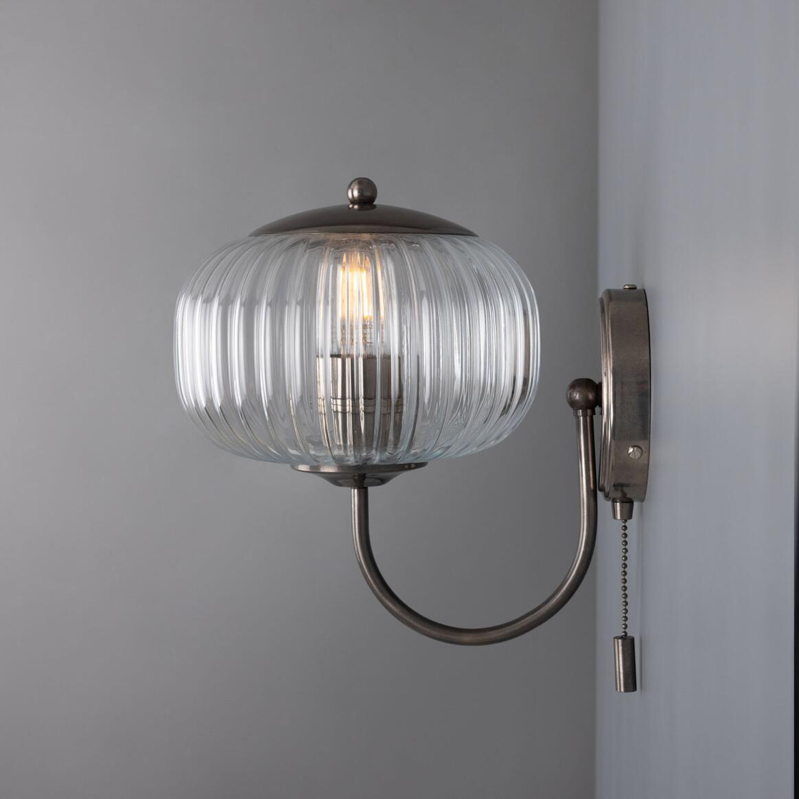Nehir Wall Lamp by Mullan Lighting with a sleek, modern design and warm ambient illumination, ideal for contemporary and timeless interiors