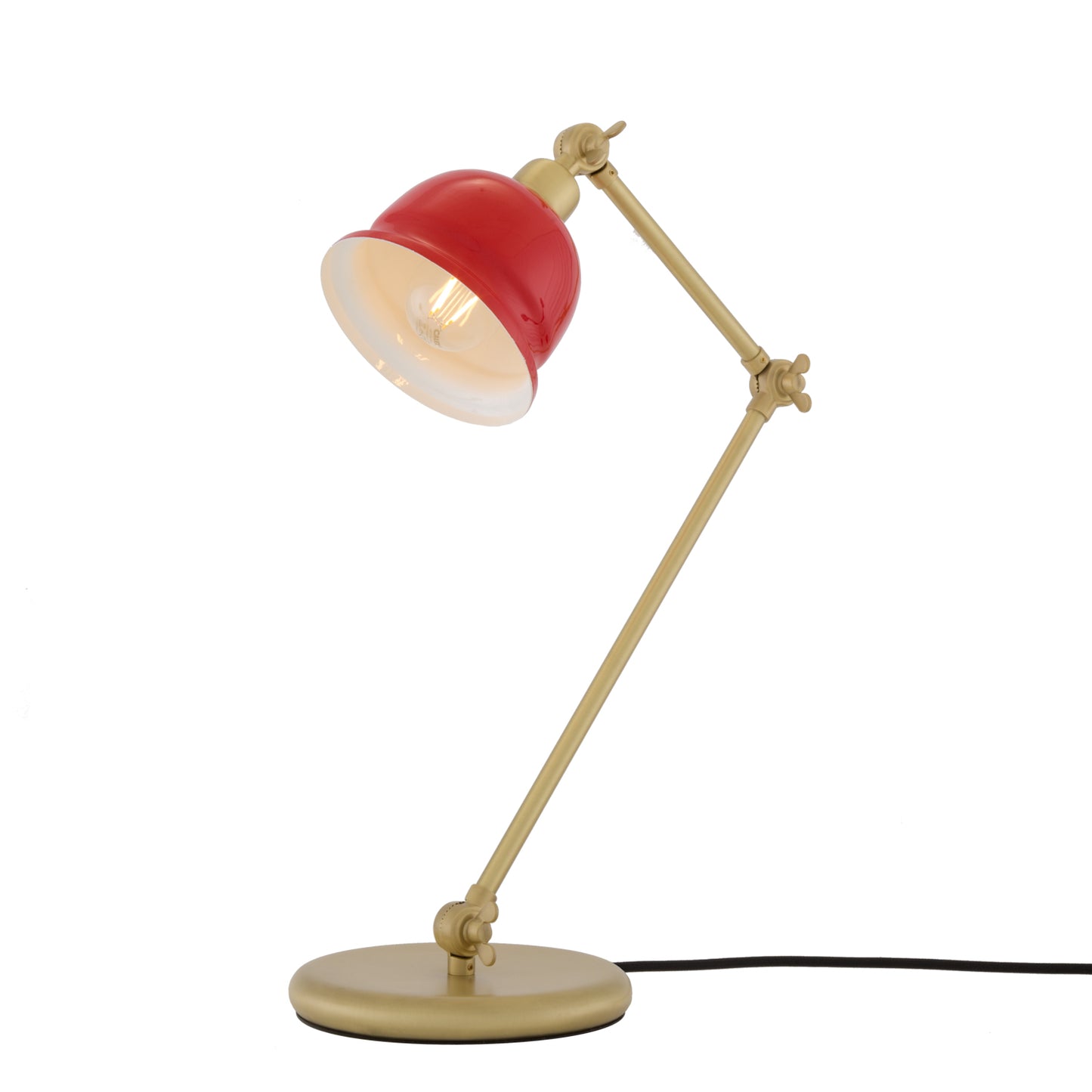 Table lamp with red shade and beige arm on a white background
