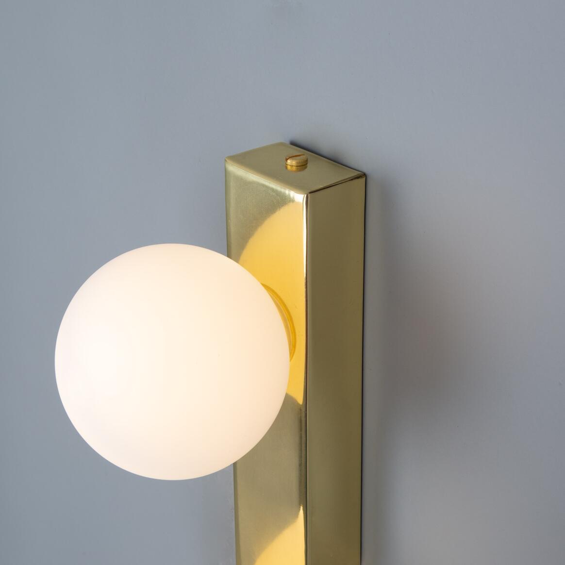 Noelani Wall Lamp by Mullan Lighting with a stylish contemporary design and soft ambient glow, ideal for modern homes and elegant commercial interiors