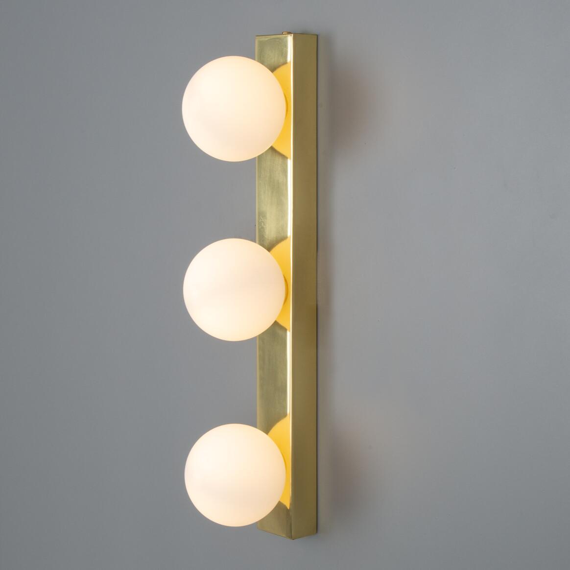 Noelani Wall Lamp by Mullan Lighting with a stylish contemporary design and soft ambient glow, ideal for modern homes and elegant commercial interiors