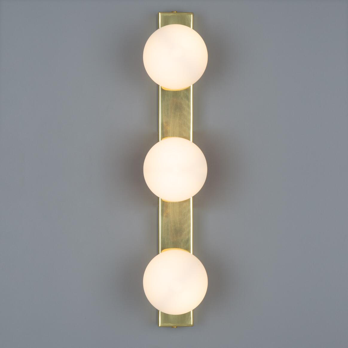 Noelani Wall Lamp by Mullan Lighting with a stylish contemporary design and soft ambient glow, ideal for modern homes and elegant commercial interiors