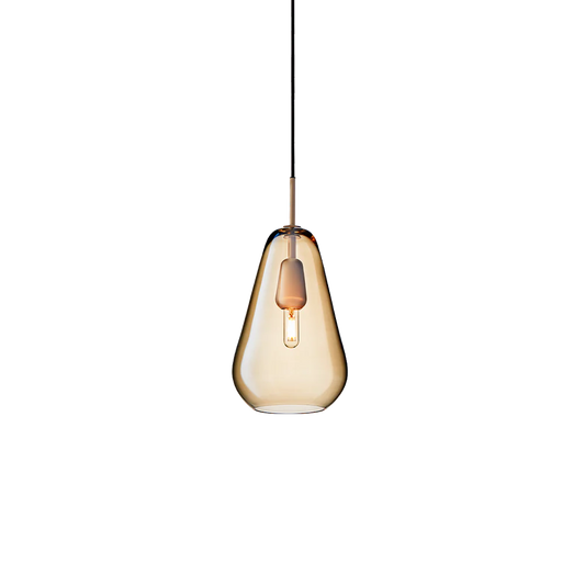 Anoli 1 medium pendant lamp by Nuura with a snowdrop-inspired opal glass shade, gold metal details, and black cord — perfect for Nordic minimalist lighting.