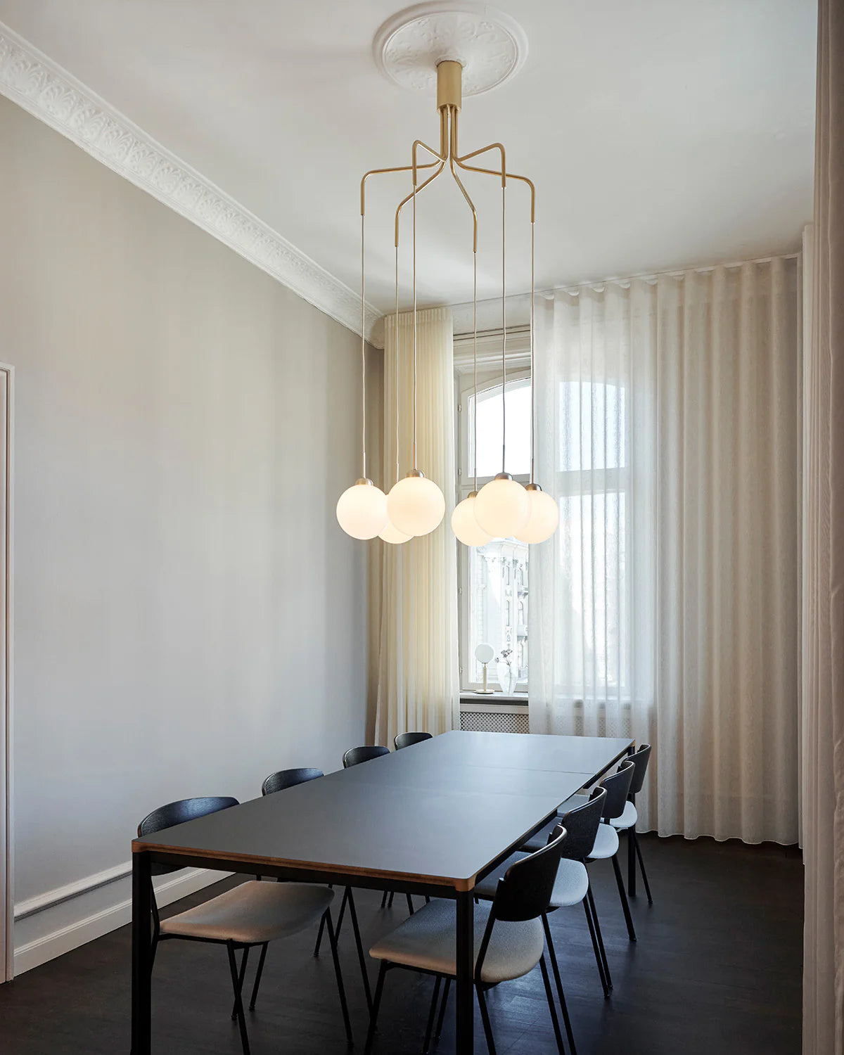 "Apiales Cluster 6 chandelier with opal glass globes and satin brass arms"

