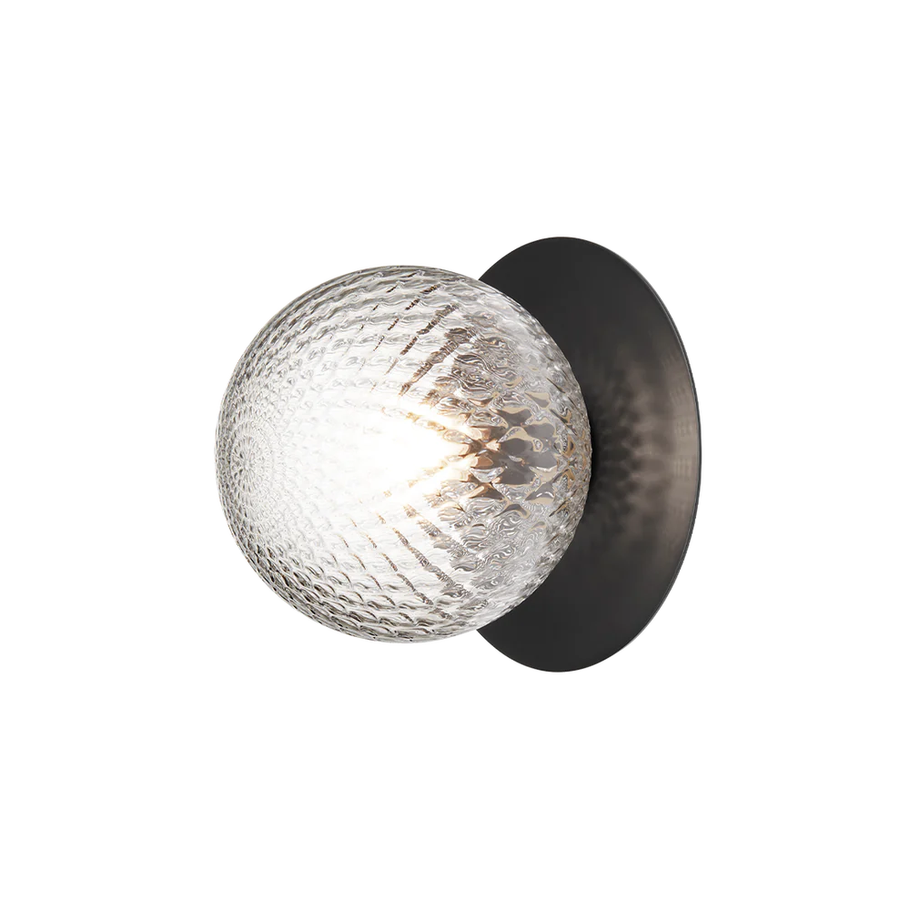 Nuura Liila 1 Outdoor Wall Lamp with black finish and clear glass globe, ideal for stylish outdoor wall or ceiling lighting in modern exterior spaces.