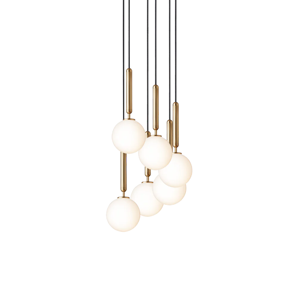 Miira 6 Chandelier in brass and opal by Nuura is Scandinavian light for dining lights, living room lights in house interior lights as contemporary lights for home decor