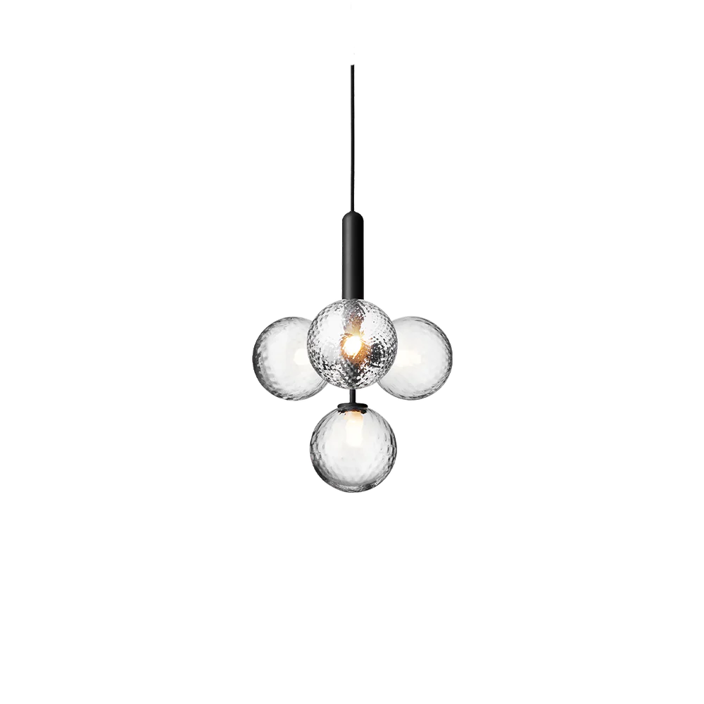 Four-light Scandinavian pendant lamp by Nuura, featuring black frame and clear glass shades for living room , dining room or kitchen lights