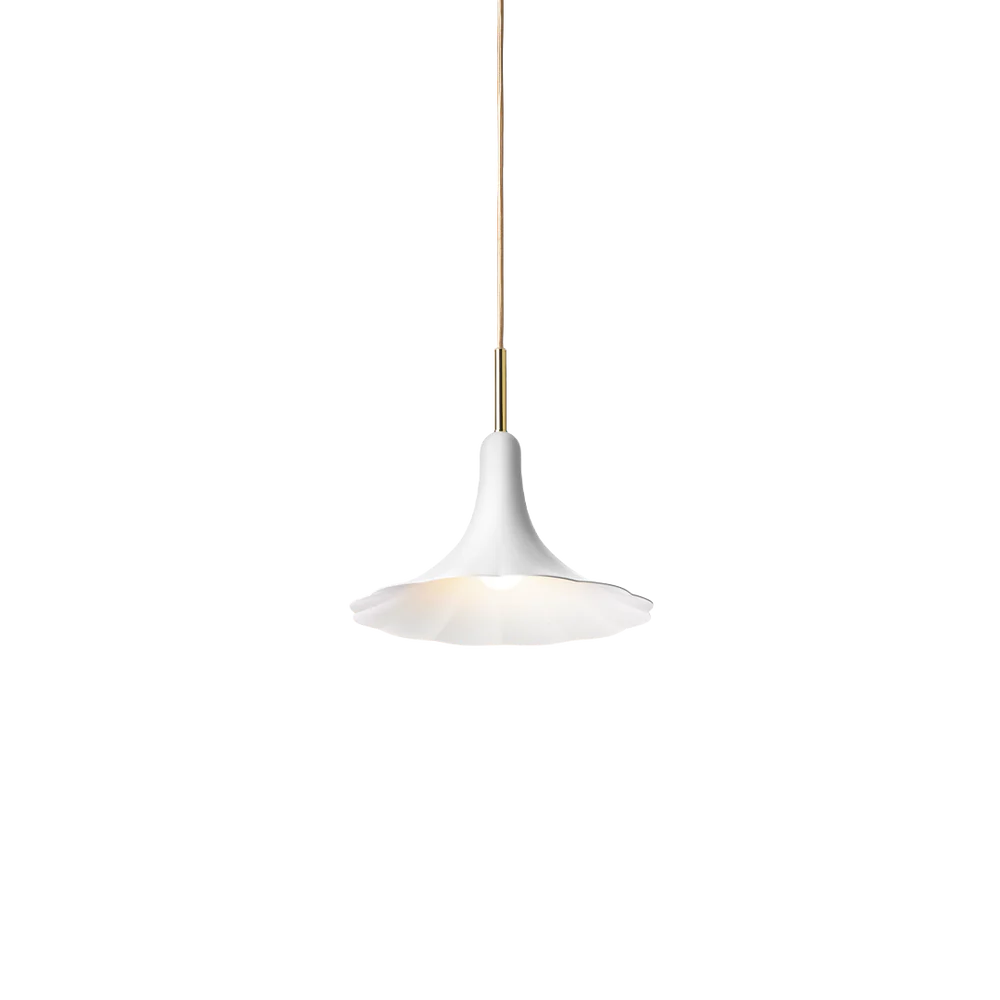 "Elegant floral pendant by Nuura with brass details and soft lighting"

