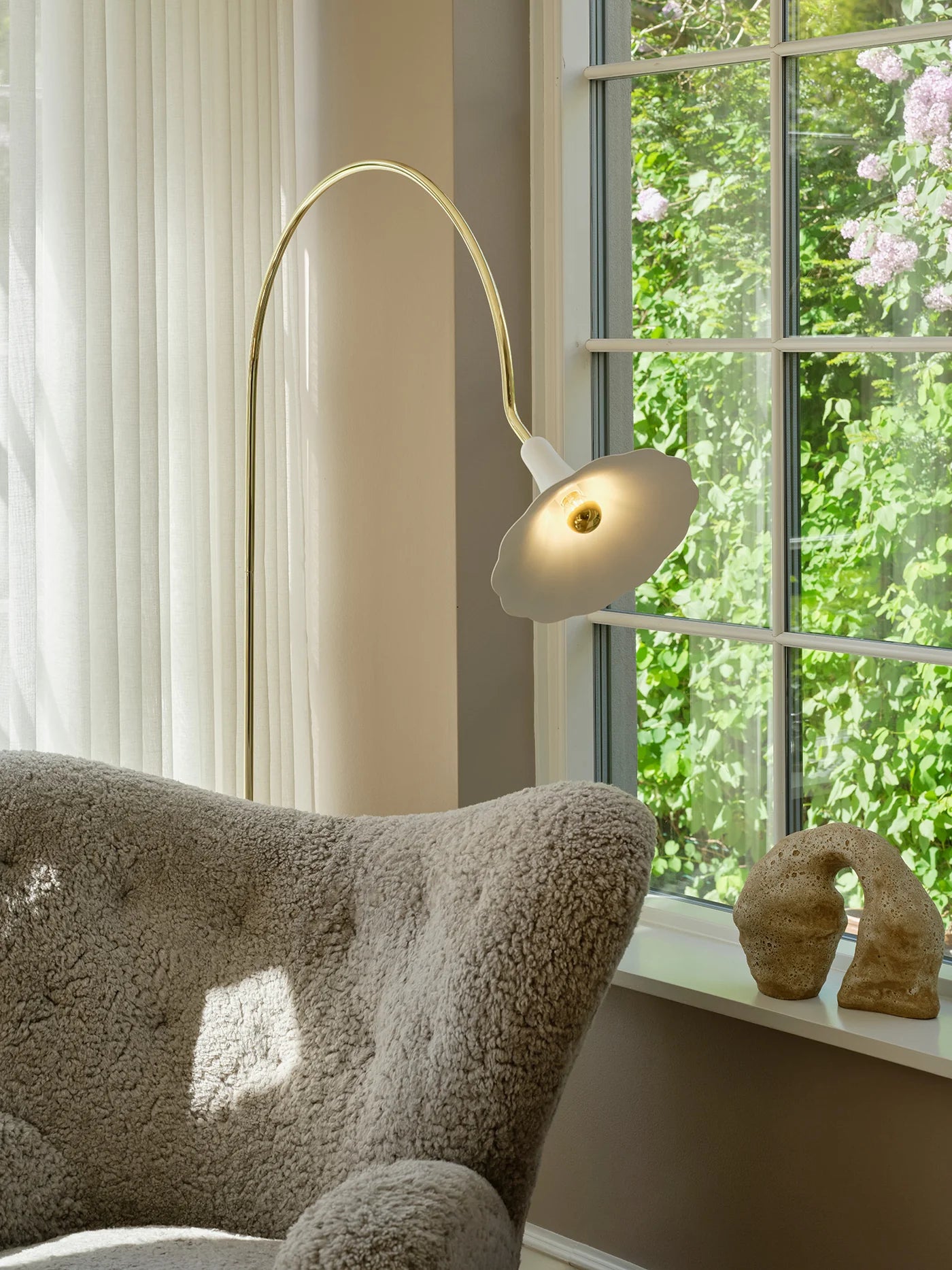 Elegant flower-inspired floor lamp by Nuura for modern interiors