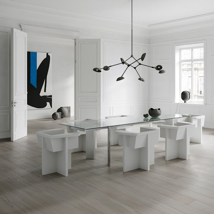  Drop Chandelier by 101 Copenhagen suspended from the ceiling with multiple adjustable arms and opal glass globes