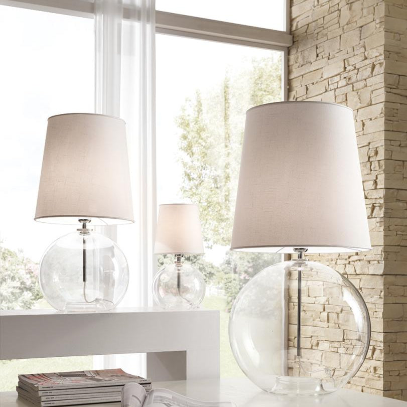 Parigi table lamp by Cangini & Tucci featuring handcrafted glass, elegant Italian design, and warm ambient lighting for modern interiors.