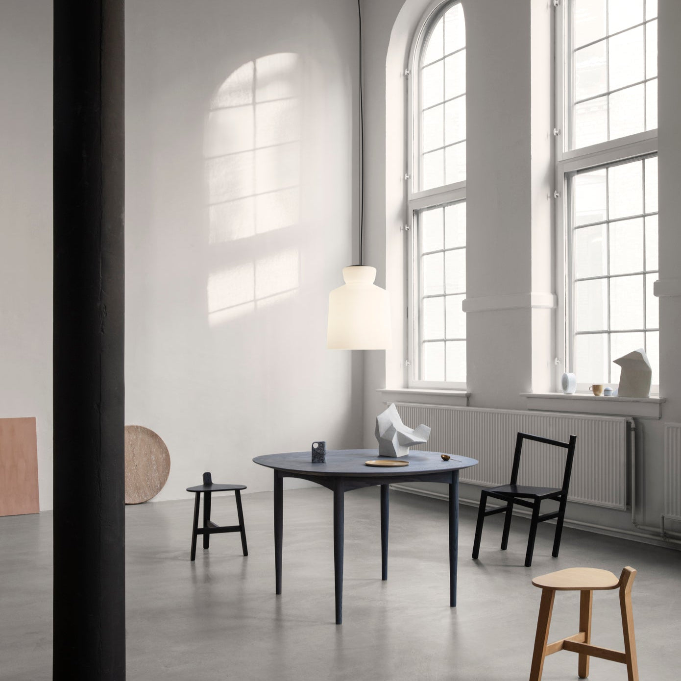 Astep SB Cinquantotto Suspension Lamp with a minimalist opaline glass sphere and sleek metal detailing, delivering soft, diffused ambient light.