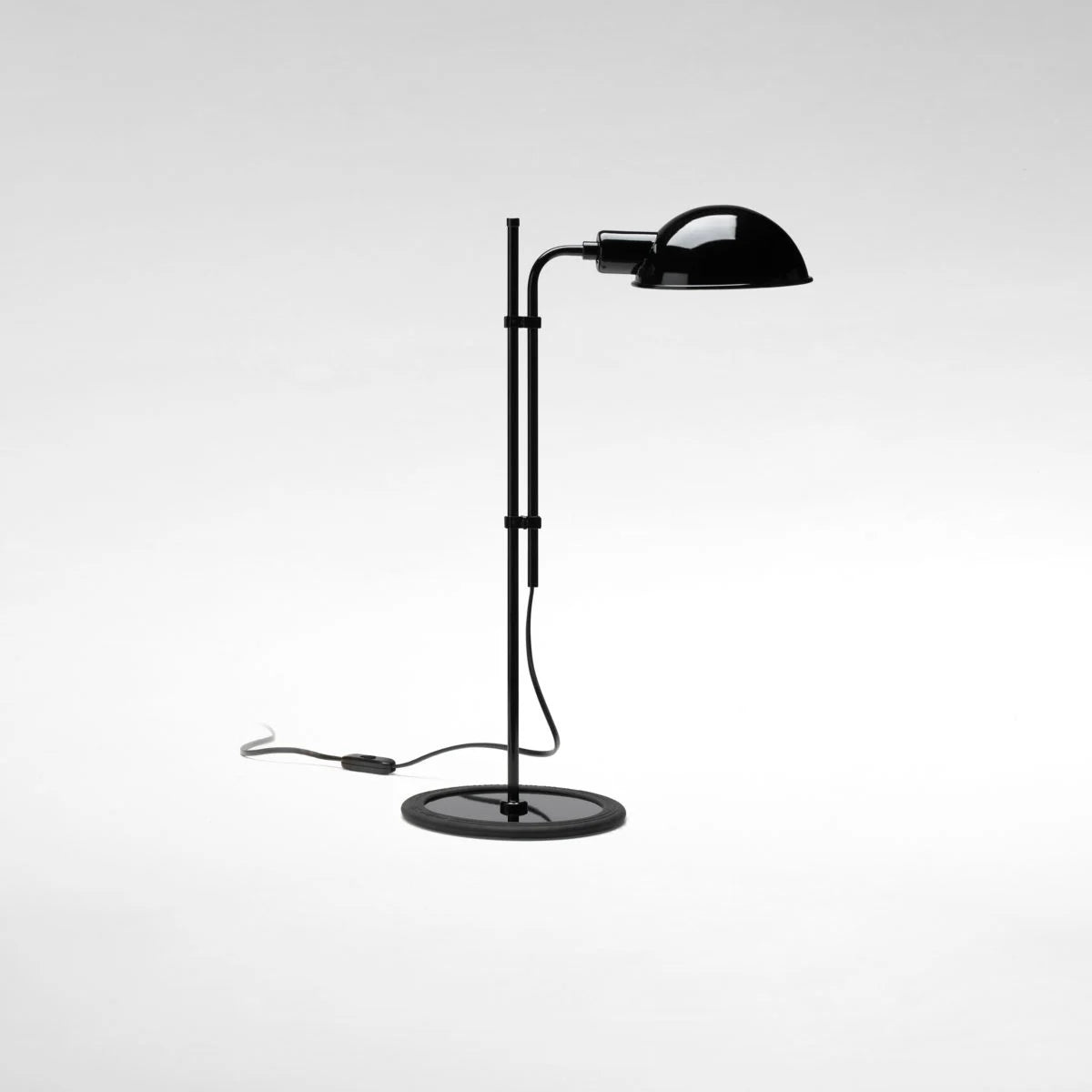 Black industrial style white adjustable Table lamp for bedroom reading area, study room by Marset