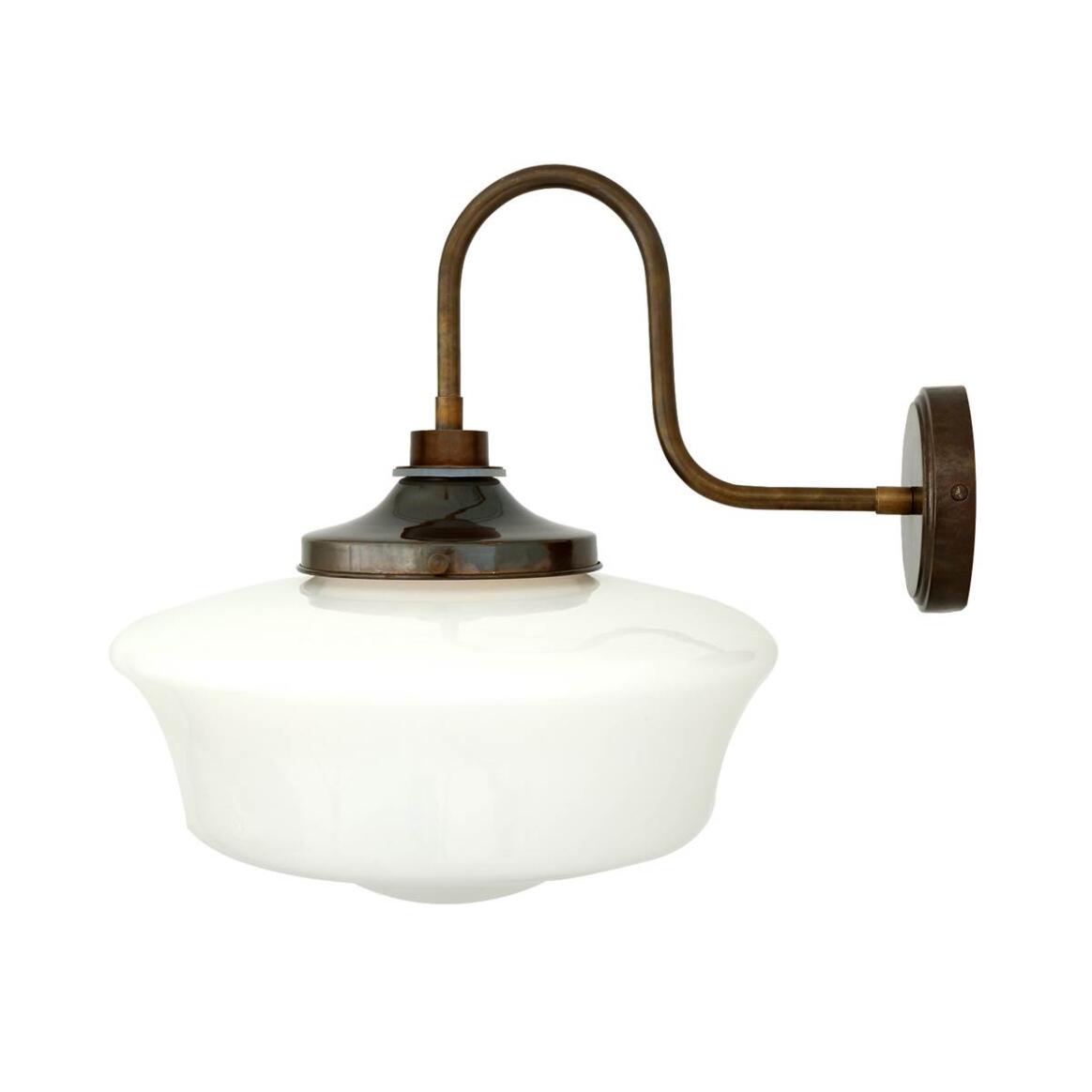 Vintage-style wall-mounted light fixture with white glass shade on a white background