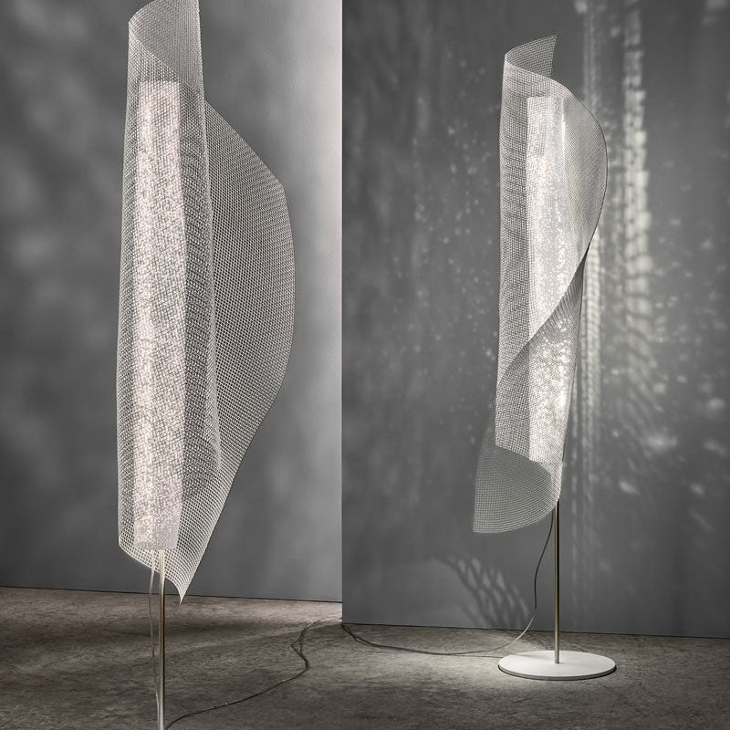 Sculptural Clara floor Lamp featuring organic curves and soft diffused lighting, crafted by A Emotional Light for stylish interiors.