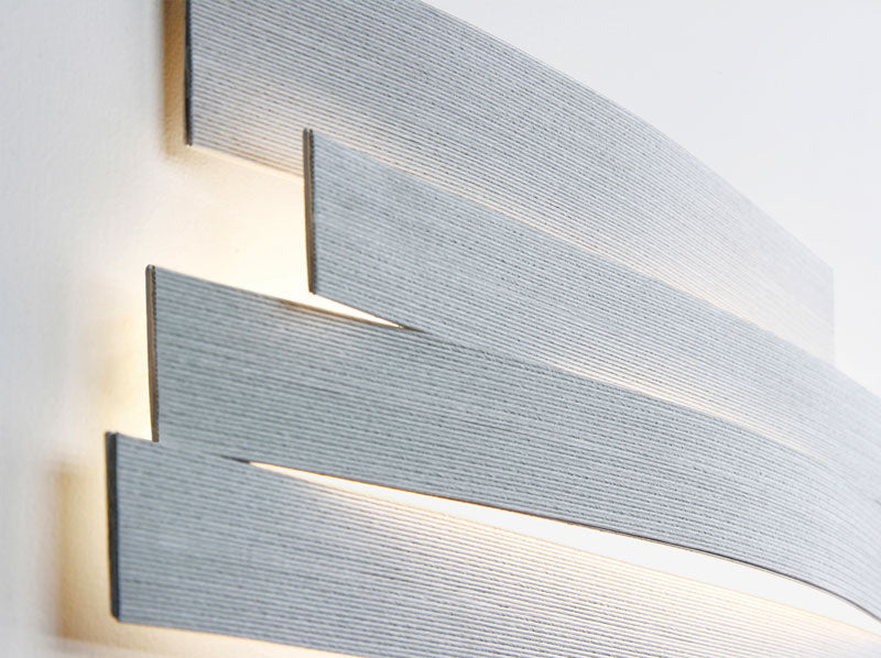 Discover the Li Wall Lamp—an elegant minimalist lighting design that provides soft ambient illumination for contemporary interiors.