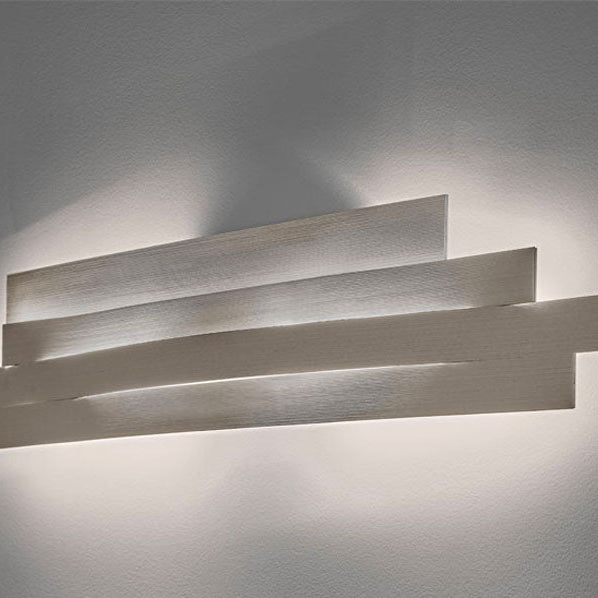 Discover the Li Wall Lamp—an elegant minimalist lighting design that provides soft ambient illumination for contemporary interiors.