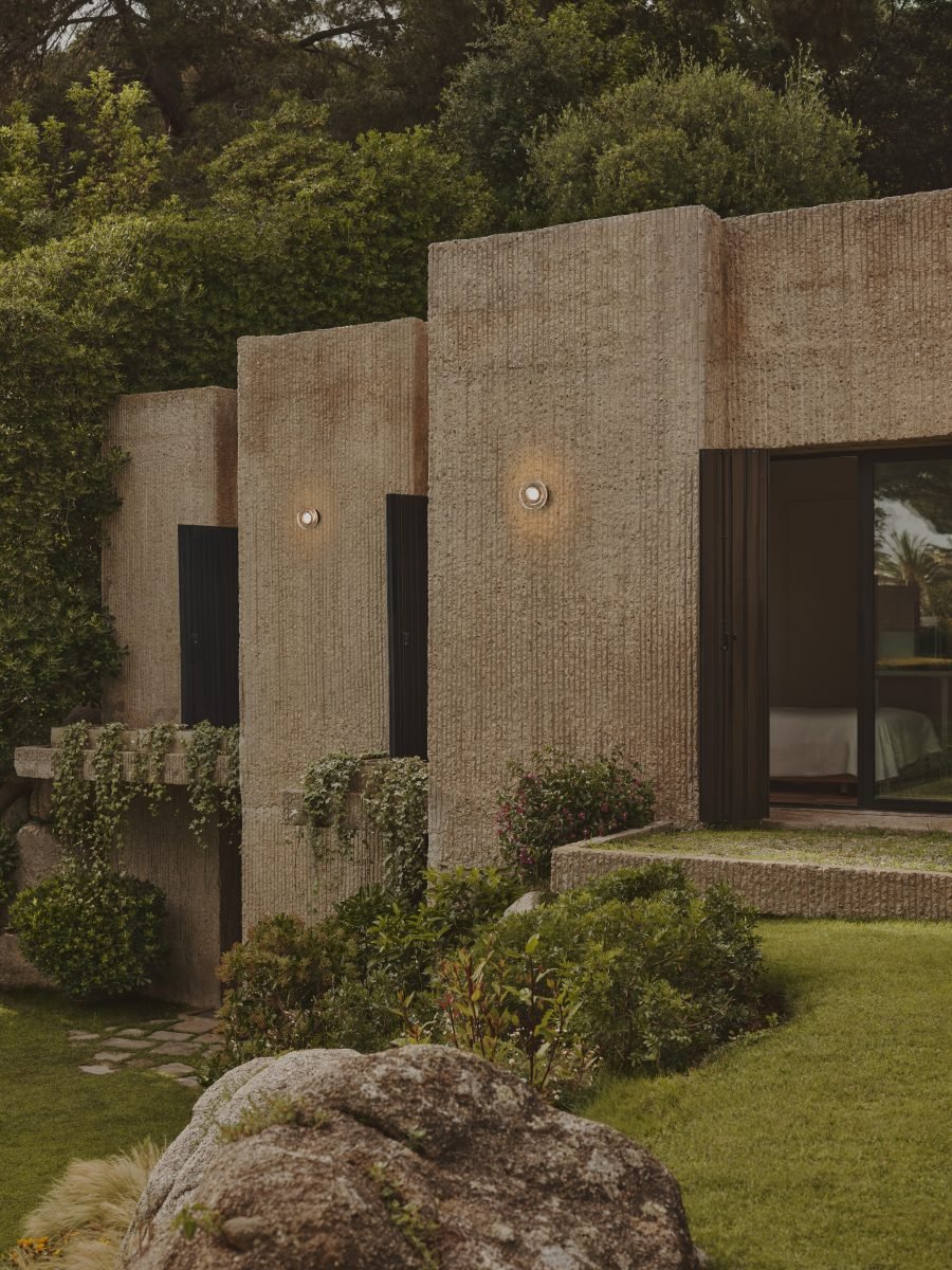 Roc wall lamp by Marset with soft diffused light, sculpted ceramic design and warm ambient glow, ideal for modern interiors and decorative wall lighting