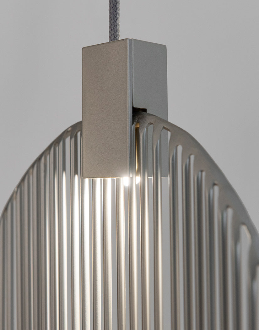 Artistic harp-inspired pendant light from Terzani featuring elegant curved metal elements.