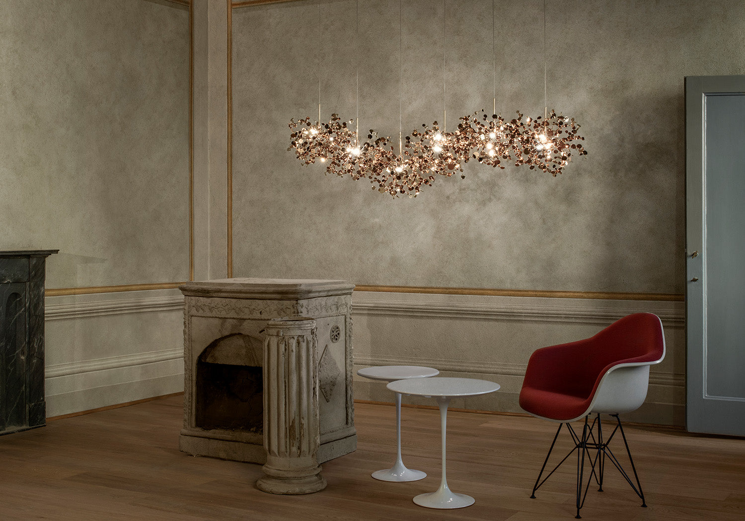 Argent Linear Suspension by Terzani with shimmering clustered metal discs in a sleek linear form