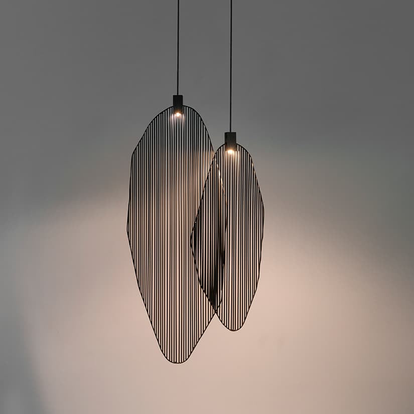 Artistic harp-inspired pendant light from Terzani featuring elegant curved metal elements.