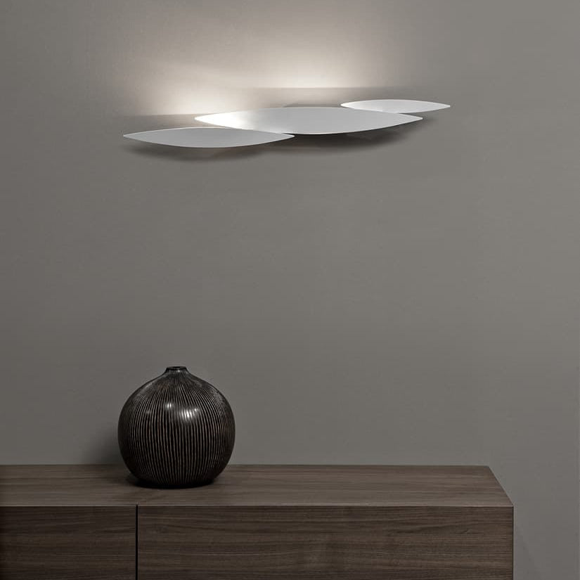 Contemporary lighting design—Terzani I Lucci Argentati casting reflective ambient glow.