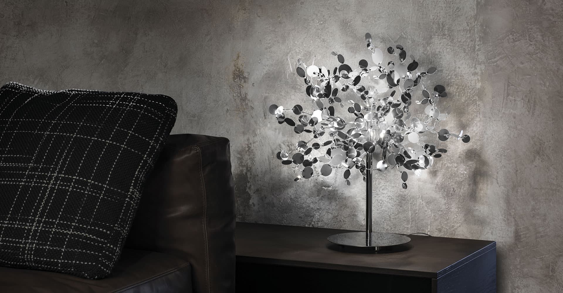Luxury Italian table lamp—Terzani Argent with sculptural reflective metal elements