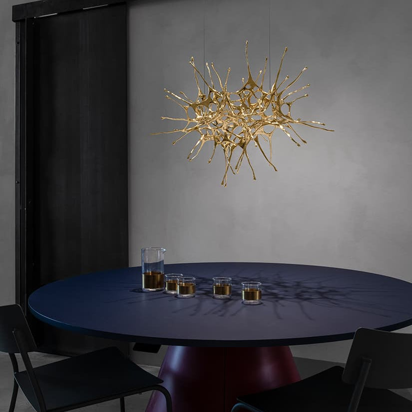 Dragon Suspension by Terzani hanging light with sculptural, flowing design and metallic finish.