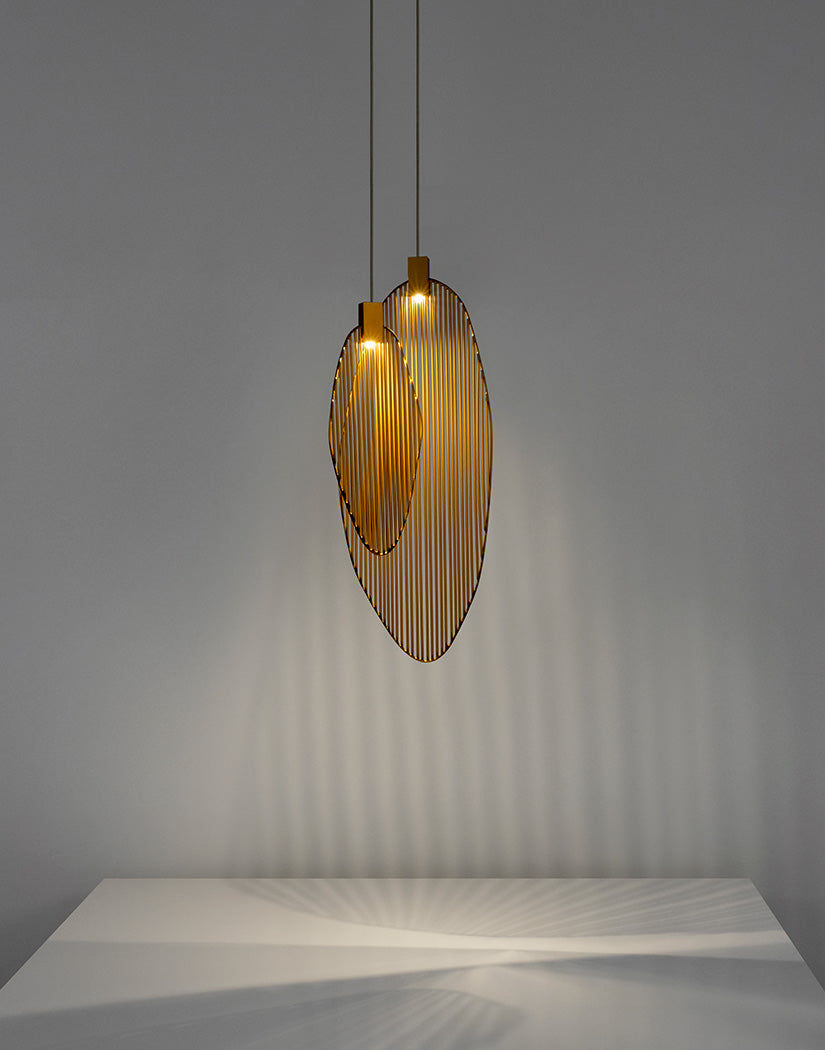 Artistic harp-inspired pendant light from Terzani featuring elegant curved metal elements.